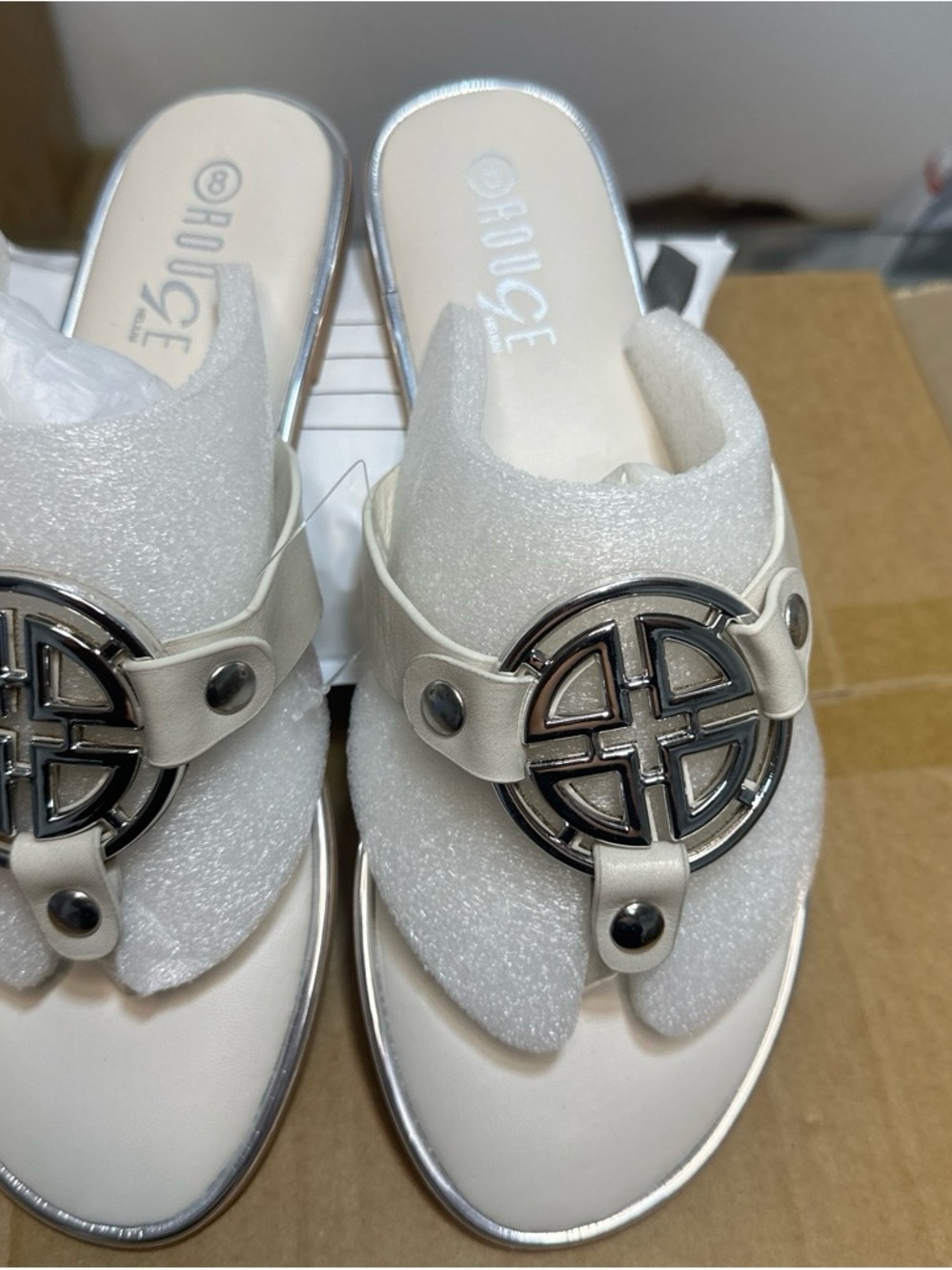 Rouge Helium White Slide Mules with Silver Medallion